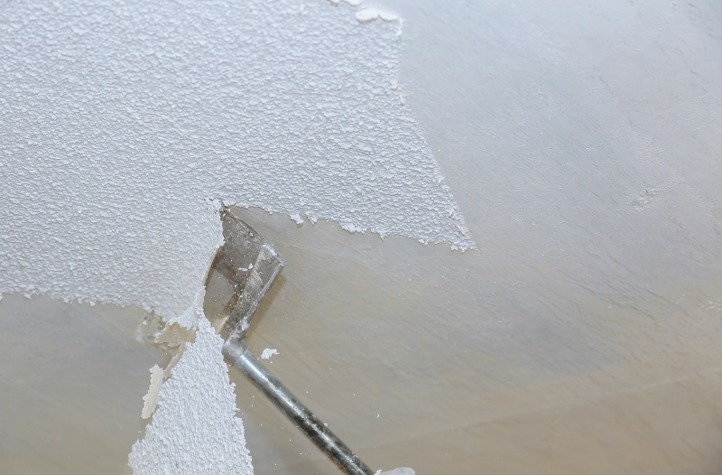 Removal old dirty popcorn ceiling wall background